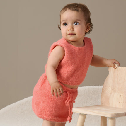 Breipakket babytopje model 12 Cosy Socks 4 Babies van Lana Grossa, originele foto